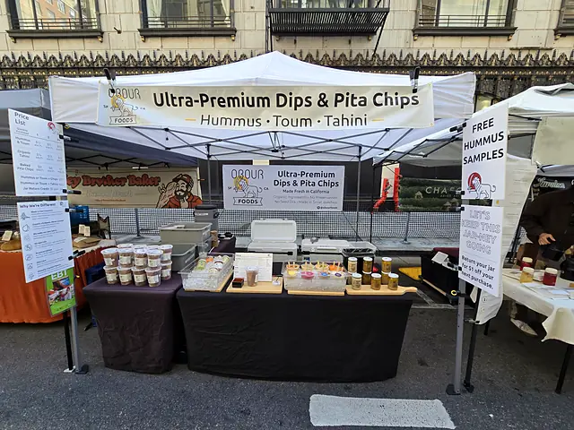 The Obour tent set up on a city street market