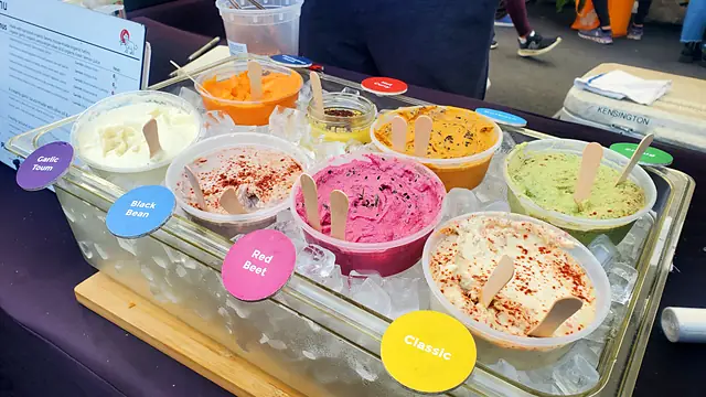 A tray of Obour samples with flavor labels, seen from the side