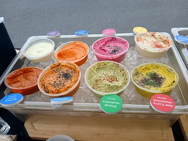 A tray of Obour samples on ice at the front of the market table